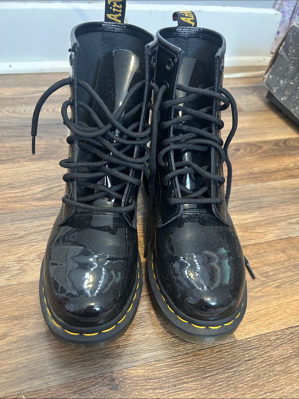 Dr. Martens Black Patent Lace-Up Boots with Yellow Stitching